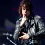 Julian Casablancas of The Strokes performing