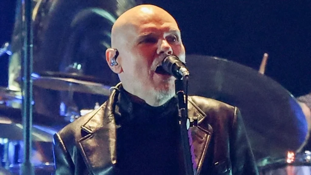 Billy Corgan of The Smashing Pumpkins singing on stage