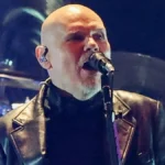Billy Corgan of The Smashing Pumpkins singing on stage