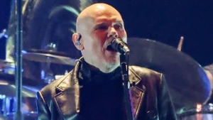 Billy Corgan of The Smashing Pumpkins singing on stage